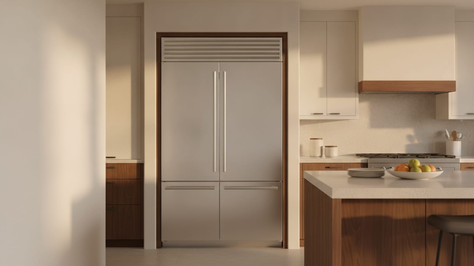 A premium built-in stainless refrigerator in a calm Southern California kitchen
